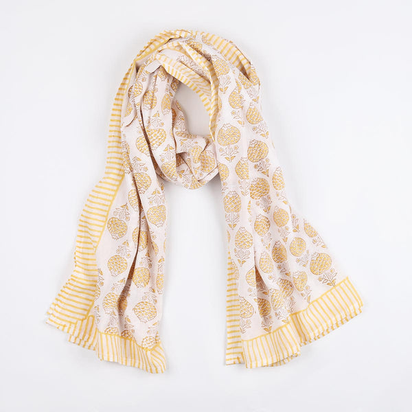 Layer up your look with this stunning scarf, made from 100% cotton and block printed by hand. Woodblock printing is a centuries-old craft. Though it might be the simplest and slowest of all textile printing methods, it yields some of the most beautiful results. 