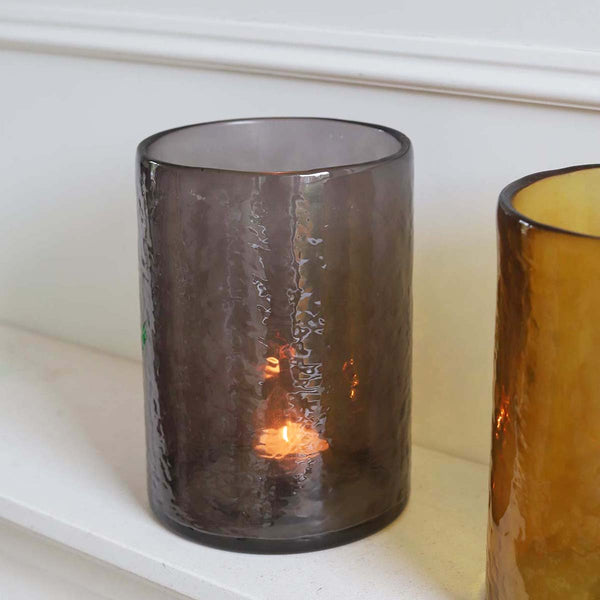 <p>Handmade by artisans in India<p>

<P>Create a warm, relaxing glow by lighting a candle in this handmade hurricane, coloured glass with a rippled textured exterior. Mix and match colours and sizes for a real statement. <P>

