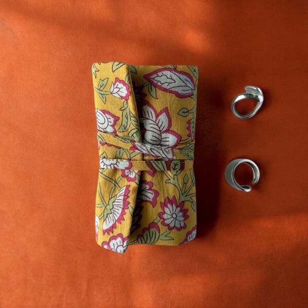 Yellow floral jewellery roll