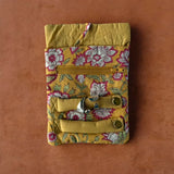 Yellow floral jewellery roll