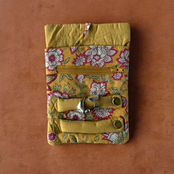 Yellow floral jewellery roll