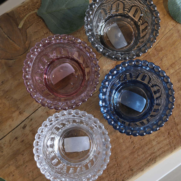 GREY PRESSED TEALIGHT HOLDER(W)
