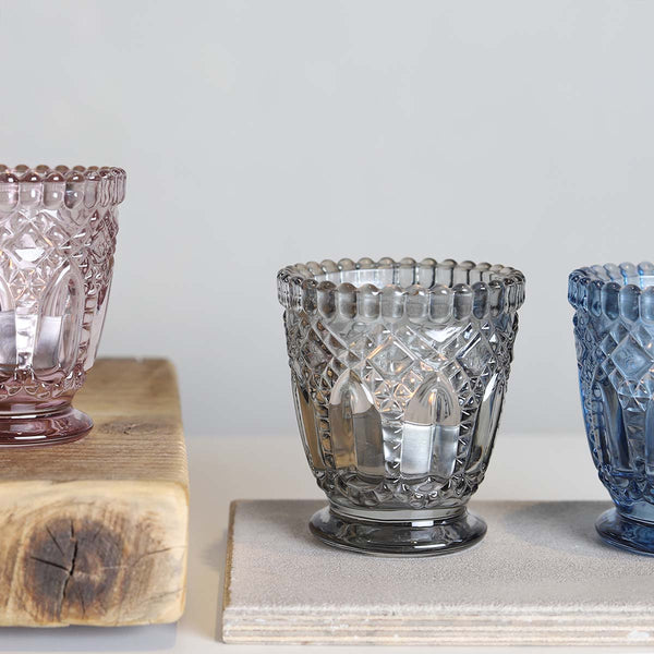 GREY PRESSED TEALIGHT HOLDER(W)
