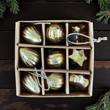 set 9 mini gold baubles