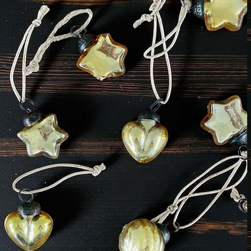 set 9 mini gold baubles