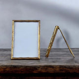edgar medium frame gold