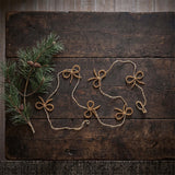 Glass bow garland - gold