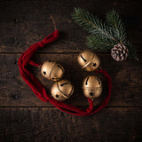 gold bell hanger  / red ribbon