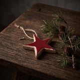red wooden star hanger
