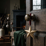 small gold star hanger /red ribbon