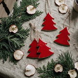 red wooden tree hanger