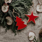 red wooden star hanger