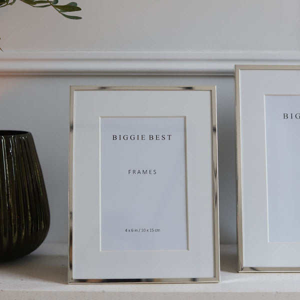 This frame is designed to hold photographs in either landscape or portrait orientations, with options for both freestanding and wall-mounted display. Placed around the home or office, photos make a room feel loved and lived in.