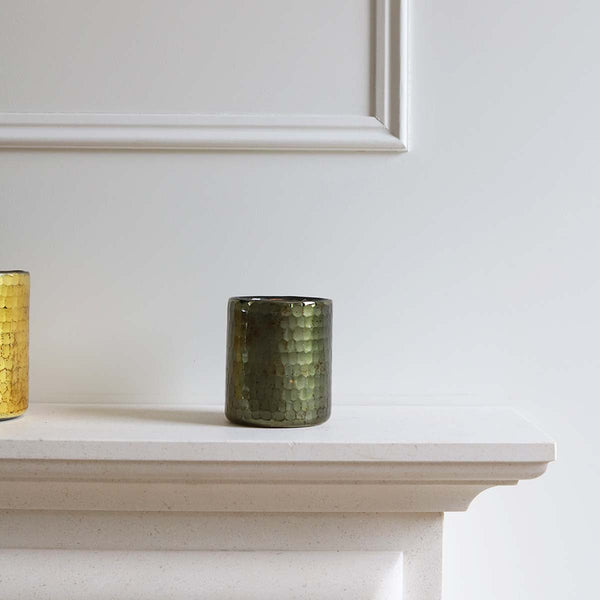 <p>Handmade by artisans in India<p>

<p>This glass tealight/votive holder looks beautiful both with and without a candle glowing inside. It’s a perfect addition to any decor. Have a cluster of holders to create a dazzling feel in your home. Stunning for use in living, hallways and outdoor spaces<p>

