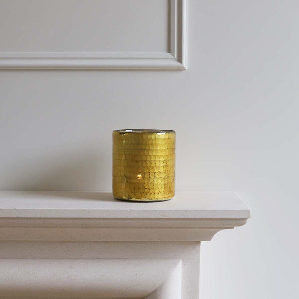 <p>Handmade by artisans in India<p>

<p>This glass tealight/votive holder looks beautiful both with and without a candle glowing inside. It’s a perfect addition to any decor. Have a cluster of holders to create a dazzling feel in your home. Stunning for use in living, hallways and outdoor spaces<p>

