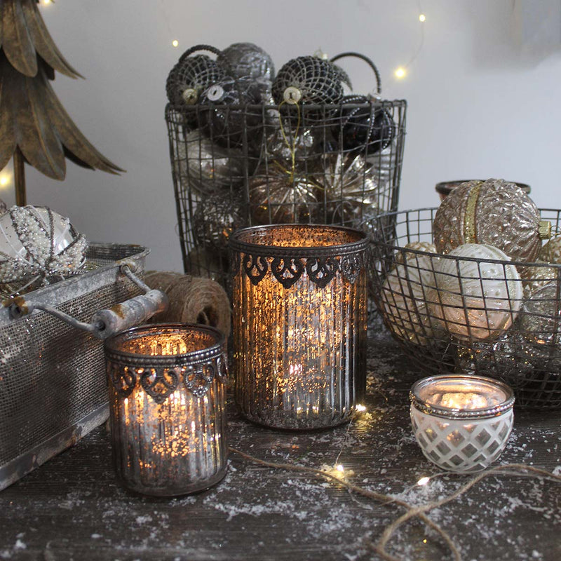 Glass tealight/votive holder looks beautiful both with and without a candle glowing inside. It is a perfect addition to any decor.

Have a cluster of holders to create a dazzling feel in your home. Stunning for use in living, hallways and outdoor spaces 

