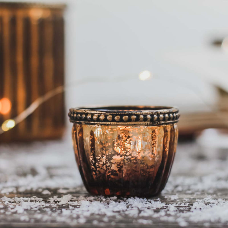 Glass tealight/votive holder look beautiful both with and without a candle glowing inside. It is a perfect addition to any decor.

Have a cluster of holders to create a dazzling feel in your home. Stunning for use in living, hallways and outdoor spaces 

