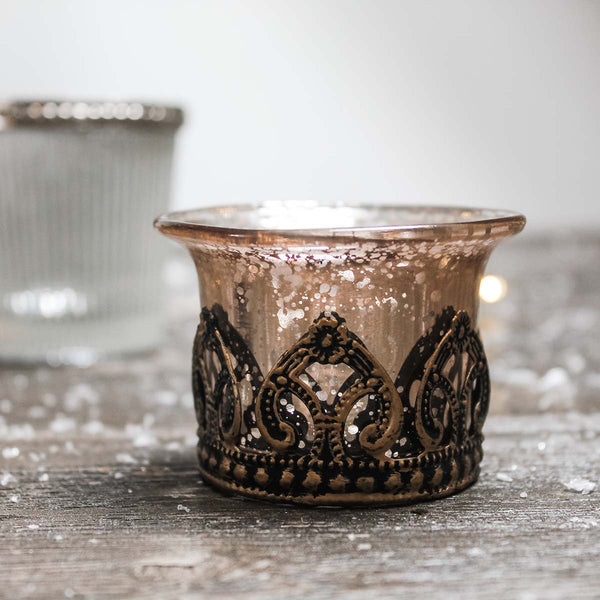 Glass tealight/votive holder look beautiful both with and without a candle glowing inside. It is a perfect addition to any decor.

Have a cluster of holders to create a dazzling feel in your home. Stunning for use in living, hallways and outdoor spaces 


