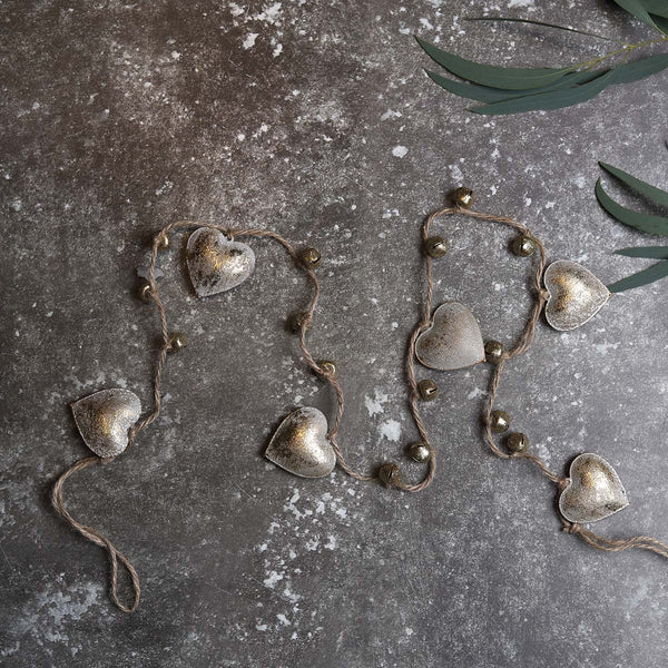 A lovely heart garland with small golden bells. great for the festive season.