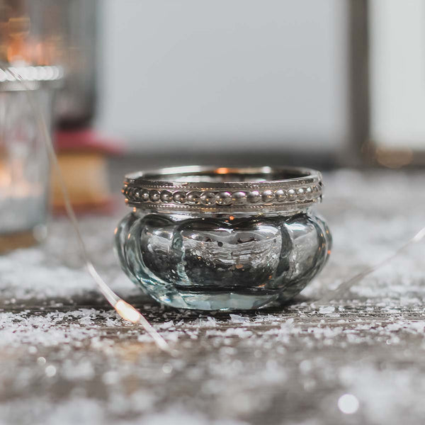 Glass tealight/votive holder look beautiful both with and without a candle glowing inside. It is a perfect addition to any decor.

Have a cluster of holders to create a dazzling feel in your home. Stunning for use in living, hallways and outdoor spaces 

