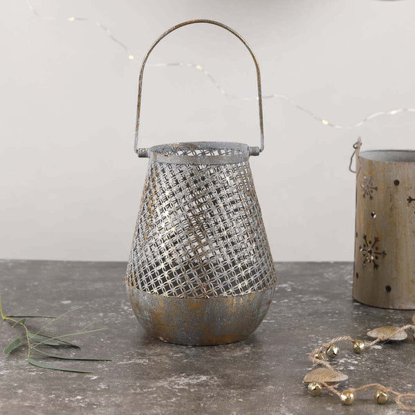 Light the candle and put it in the rustic golden candle holder to add perfect shimmer to the room.