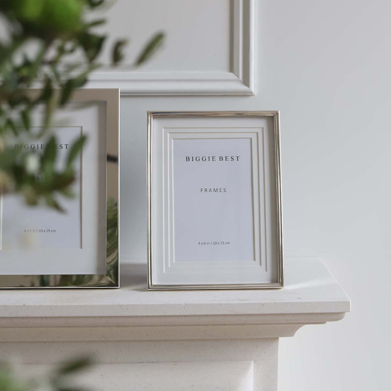 This frame is designed to hold photographs in either landscape or portrait orientations, with options for both freestanding and wall-mounted display. Placed around the home or office, photos make a room feel loved and lived in.