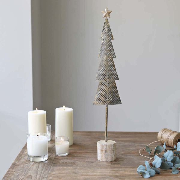 A lovely festive christmas tree, available in both small and large, group a few together  to make a christmas scene 