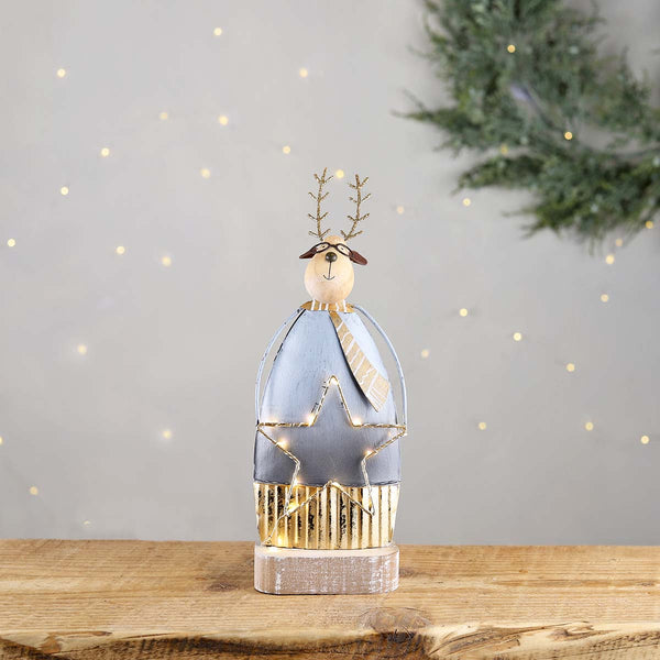 A lovely little christmas deer, with tall glittery antlers, and holding a light up star he will look great in any festive home.