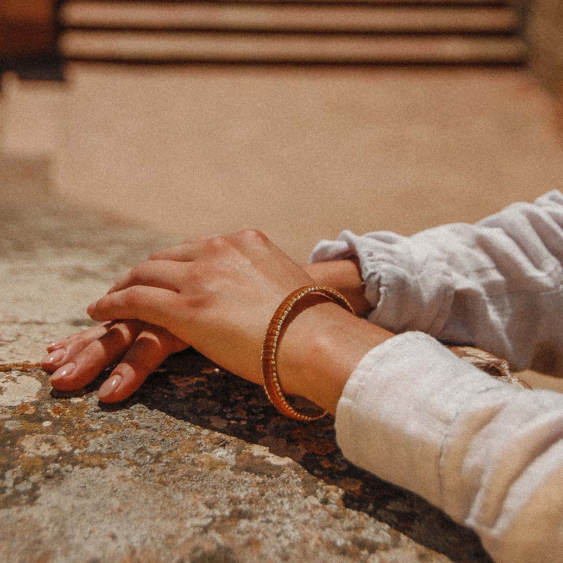 Enhance your wrist with this golden/brass effect open cuff bracelet with bronze wrapped thread and gold thread edges, a beautiful piece.