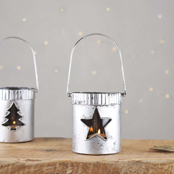 A great addition to your festive home, pop in a candle and let the light dance though the star, hang by the handle or stand on a mantlepiece or windowsill.