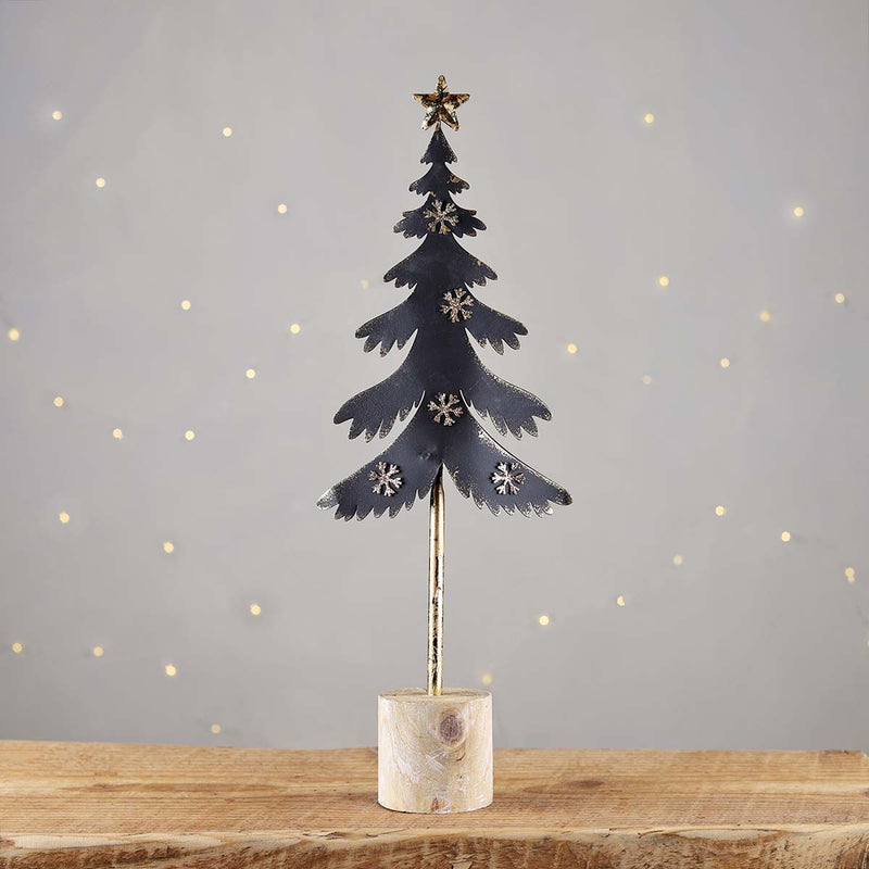 A festive charcoal and gold tree with gold snowflakes and a star to top. Group a few trees together to make a great display.