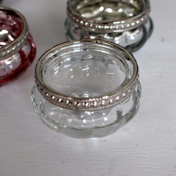 Glass tealight/votive holder look beautiful both with and without a candle glowing inside. It is a perfect addition to any decor.

Have a cluster of holders to create a dazzling feel in your home. Stunning for use in living, hallways and outdoor spaces 

