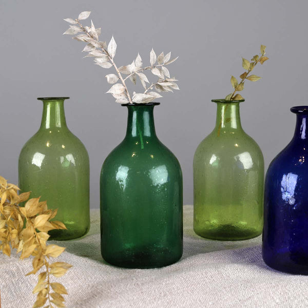 <P>Elegant recycled glass vase, this will enhance any room and add a pop of colour. <P>

<P>Made in a beautiful array of colours, mix and match to create a display. <P>

<P>Surface Imperfections are to be expected <P>

<P>Flowers not included<P>

