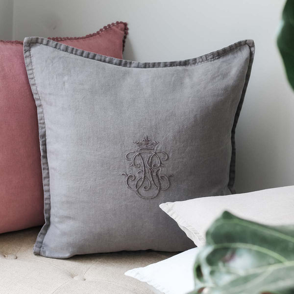 Our pure linen cushions are filled with a feather inner for a comfortable relaxed look that works wonderfully whether placed on your sofa, chair or bed.The dark grey linen is darker than the plain grey and has a charcoal look. 