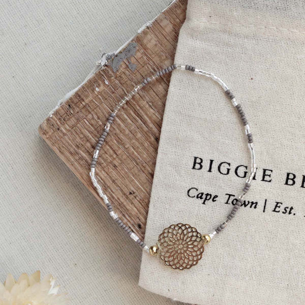 A simple but beautiful bracelet that works well individually or stacked with other accessories in the collection. 100% hand crafted made by artisans in India. 


