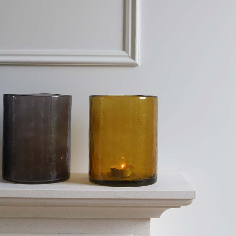 <p>Handmade by artisans in India<p>

<P>Create a warm, relaxing glow by lighting a candle in this handmade hurricane, coloured glass with a rippled textured exterior. Mix and match colours and sizes for a real statement. <P>

