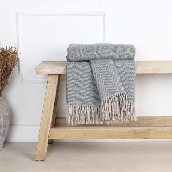 This soft and cosy 100% Australian wool throw with tassels, is just perfect over your legs, around your shoulders on cool evening, or as a runner at the end of the bed for a bit of extra warmth.