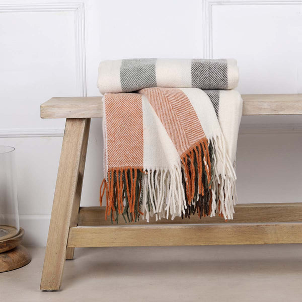 This soft and cosy 100% Australian wool throw with tassels, is just perfect over your legs, around your shoulders on cool evening, or as a runner at the end of the bed for a bit of extra warmth.