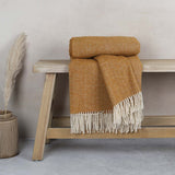 This soft and cosy 100% Australian wool throw with tassels, is just perfect over your legs, around your shoulders on cool evening, or as a runner at the end of the bed for a bit of extra warmth.