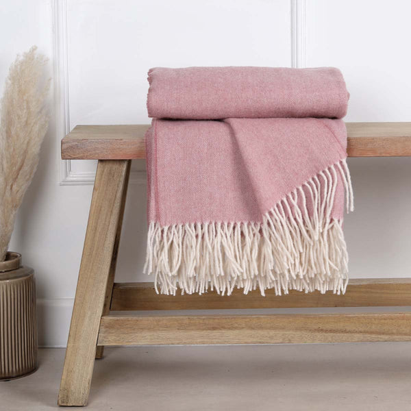 This soft and cosy 100% Australian wool throw with tassels, is just perfect over your legs, around your shoulders on cool evening, or as a runner at the end of the bed for a bit of extra warmth.